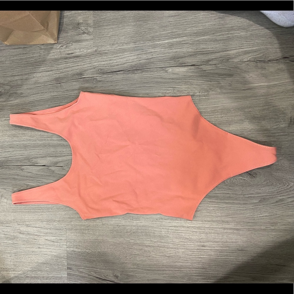 Pink thong bodysuit from Aritzia